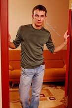 Delicious twink shows off his beautiful body in a doorway