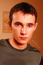 Delicious twink shows off his beautiful body in a doorway