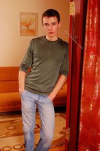 Delicious twink shows off his beautiful body in a doorway