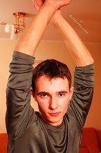 Delicious twink shows off his beautiful body in a doorway