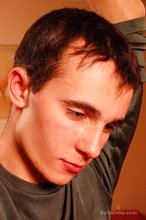 Delicious twink shows off his beautiful body in a doorway