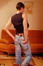 Delicious twink shows off his beautiful body in a doorway