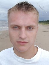 Jacked-up blonde twink doing push-ups outdoors