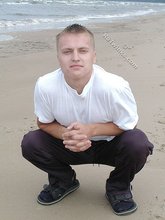 Jacked-up blonde twink doing push-ups outdoors