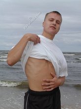 Jacked-up blonde twink doing push-ups outdoors