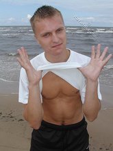 Jacked-up blonde twink doing push-ups outdoors