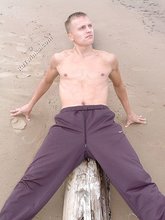 Jacked-up blonde twink doing push-ups outdoors