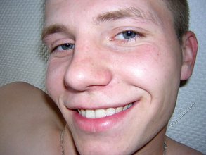 Buzzcut-sporting twink stroking his meaty dick