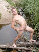 Russian twink posing with his cock out outdoors