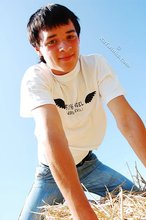 White t-shirt twink posing seductively outdoors
