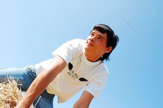 White t-shirt twink posing seductively outdoors