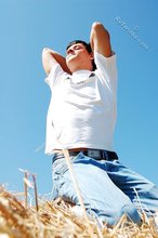 White t-shirt twink posing seductively outdoors