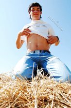 White t-shirt twink posing seductively outdoors