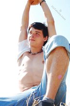 White t-shirt twink posing seductively outdoors