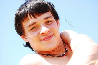 White t-shirt twink posing seductively outdoors
