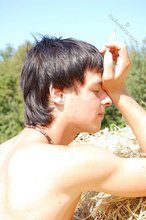 Horny boy with dyed hair masturbating outdoors