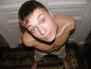 Athletic twink shows his hairy cock in the shower