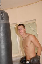 Jacked-up twink punching and looking confused