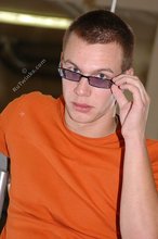 Cool shades twink posing shirtless in his gym