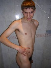 Blue-eyed twink stroking his meaty dick for you
