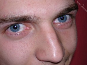 Blue-eyed twink stroking his meaty dick for you