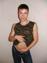 Square-jawed twink posing shirtless for you