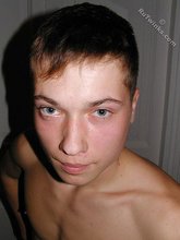 Square-jawed twink posing shirtless for you