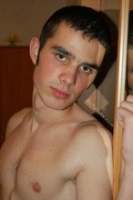 Dark-haired twink with killer body posing naked
