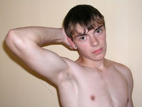 Dark-haired twink having sex with his sexy couch