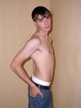 Dark-haired beauty posing in his tighty whities