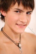 White undies twink slowly undressing on camera