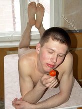 Lollipop-loving young boy showing off his booty