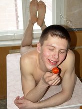 Lollipop-loving young boy showing off his booty