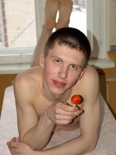 Lollipop-loving young boy showing off his booty