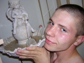 Smiling twink posing nude on the toilet (HQ gay XXX)