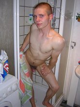 Gay twink making funny faces while eating cum