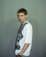 Blue-eyed twink blowing kisses after blowing his load