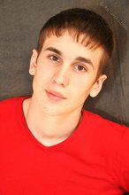 Dark-haired twink teases with his perfectly-shaped booty