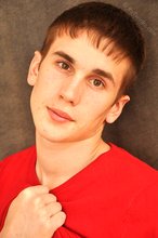 Dark-haired twink teases with his perfectly-shaped booty