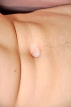 Good-looking twink with a tons of pubes jacks it on camera