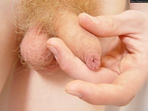 Redheaded and extremely pale twink shows his pubes and feet