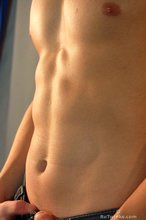 Blond-haired twink showing his muscles and sexy bulge for you