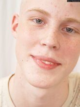 Good-looking redhead albino shows off his perky ass here