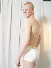 Good-looking redhead albino shows off his perky ass here