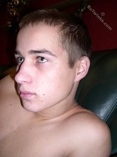 Young guy seems deep in thought as he jerks his medium boner