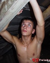 Dark-haired guy with a perfect body moving tires and looking hot