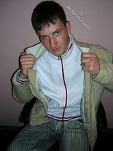 Blue-eyed twink looks positively badass in this little gallery