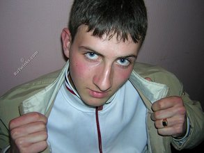 Blue-eyed twink looks positively badass in this little gallery