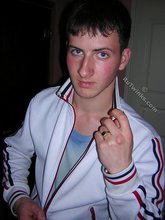Blue-eyed twink looks positively badass in this little gallery