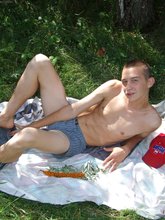 Really effeminate guy posing outdoors and teasing with his cock